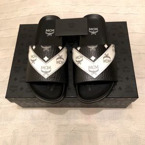 MCM Men’s Leather slide sandals.
